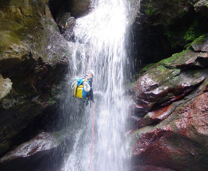 Canyoning through a waterfall in Madeira
