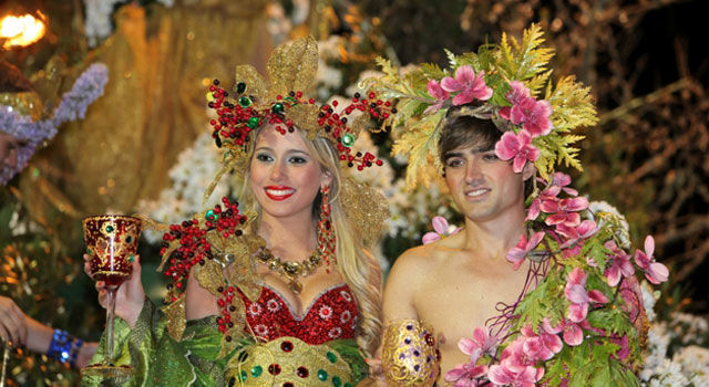 a couple in a parade at Madeira Carnival