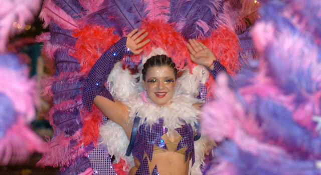 Madeira Carnival parade with a girl in purple clot